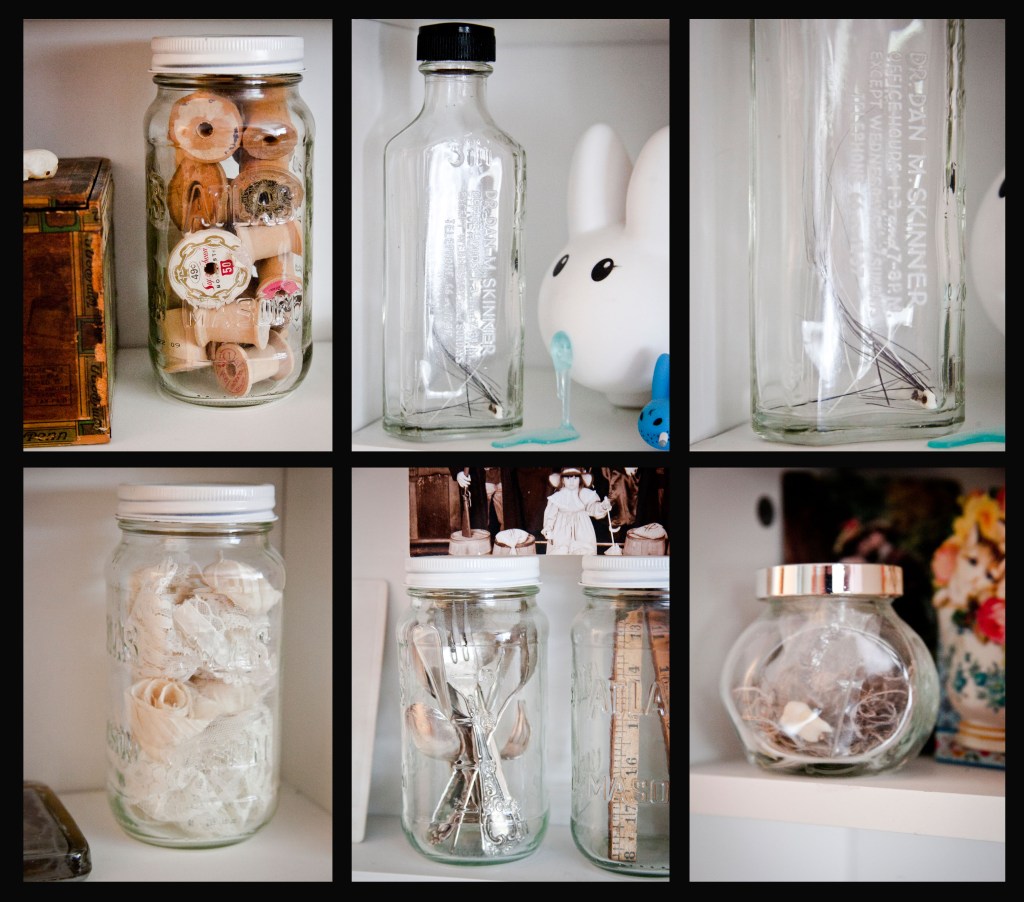 Jars of antique spools and spoons. The tall bottles belonged to Mallory's great, great, great, she wasn't really sure how many greats but he was a grandfather of hers. He was a doctor and her mother was able to find some of his medicine jars and buy them up. Now she keeps her kitty's fallen whiskers in them. A couple of saved wisdom teeth are in these jars, just in case. 