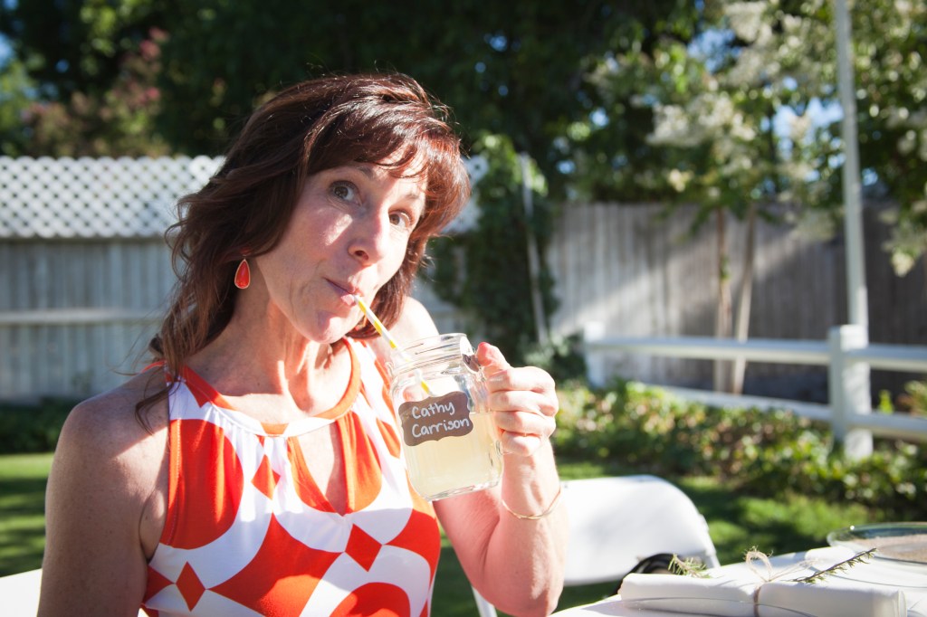 Cathy, enjoying her personalized mug of lemonade 