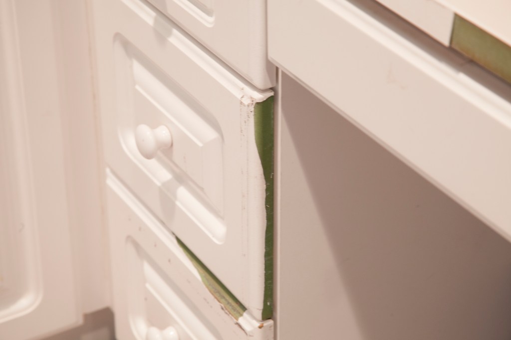 This is where my daughter's opened the drawers so they could rest their feet on something when they were on the computer. 