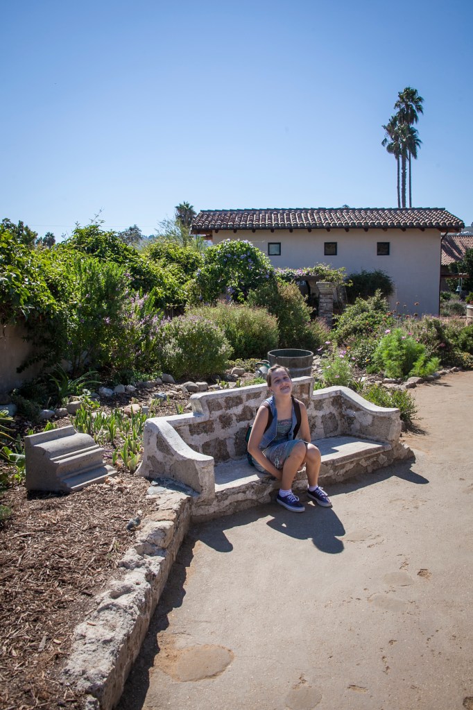 Emma asked me who would ever sit on this low bench… she would.