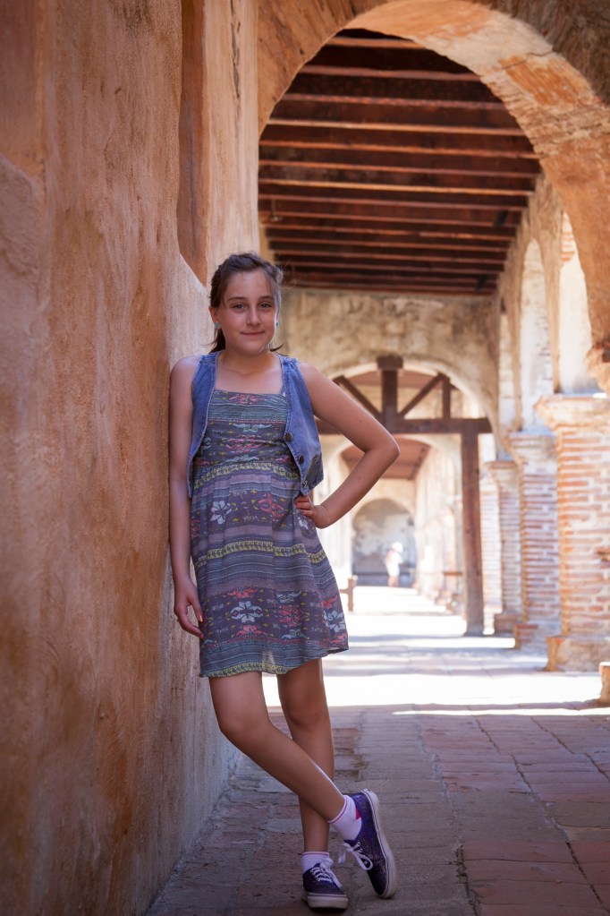 We found this lovely little hallway in the corner of the mission. It's a favorite spot for engagement shoots. The quality of light is beautiful and since it was over 90 degrees, we were happy for the shade and breeze that runs through it.