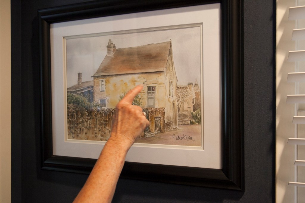 I love this painting of an English cottage. As we walked by Vickie said she would like to be sitting in that little room, right there…