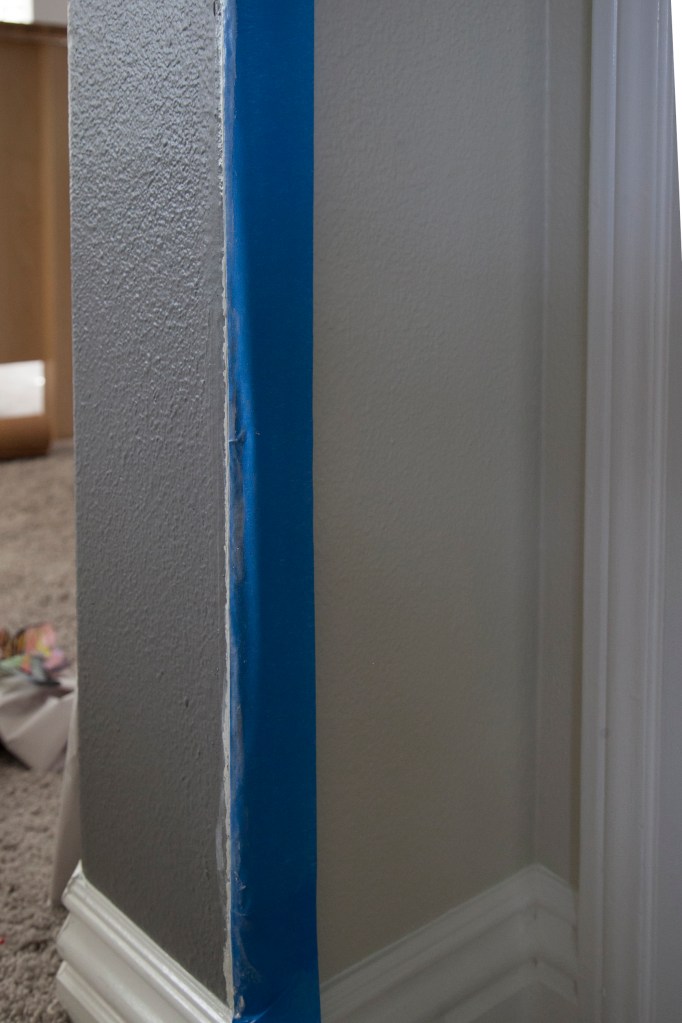 I painted the lighter shade first and when it was dry I placed the tape over it up to the line of the darker color.