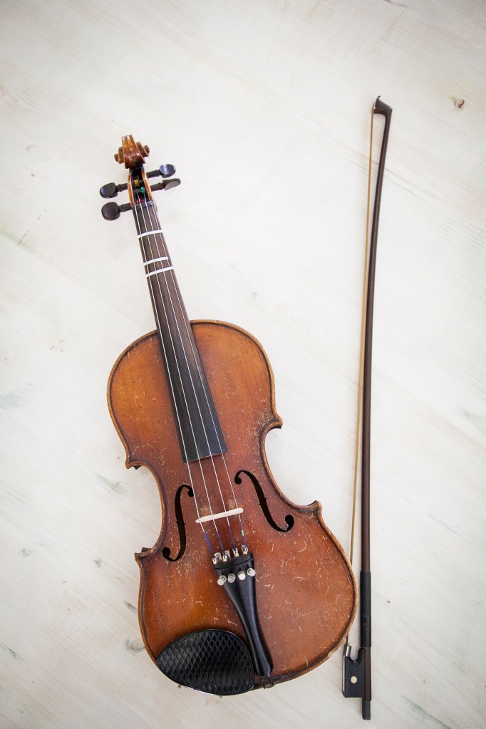 The violin with the original bow.