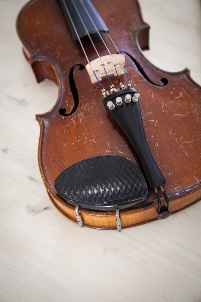 All of the pegs that hold the strings here have been added at some point because they are the wrong size and eventually I'd like to replace them. 