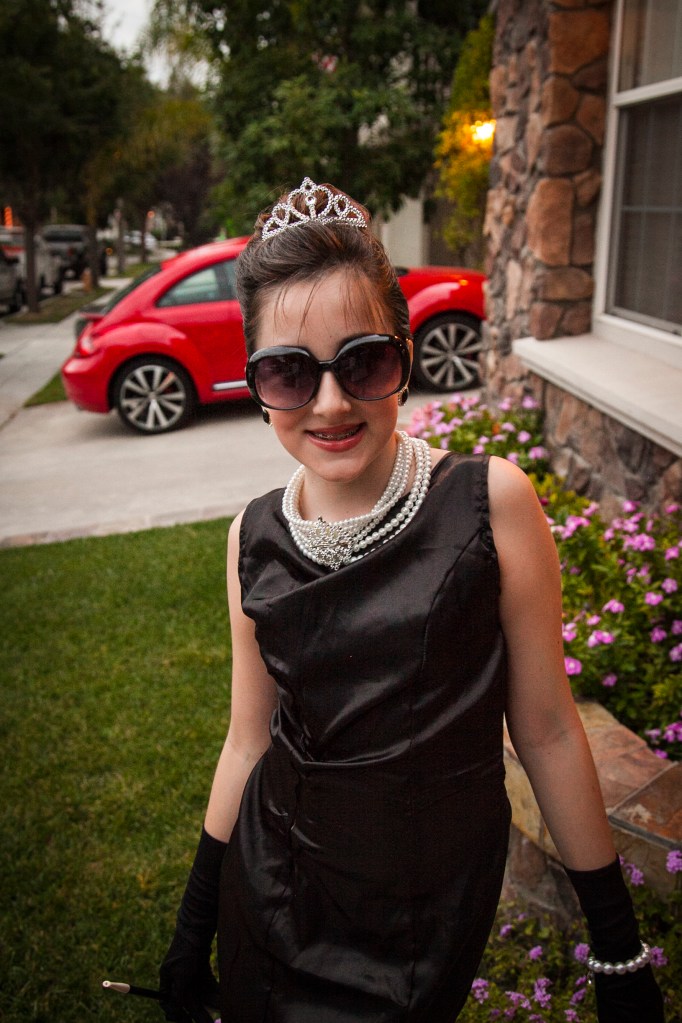 Little Halloween shot in the neighborhood standing in front of the car… This seemed like the last of the daylight for us.