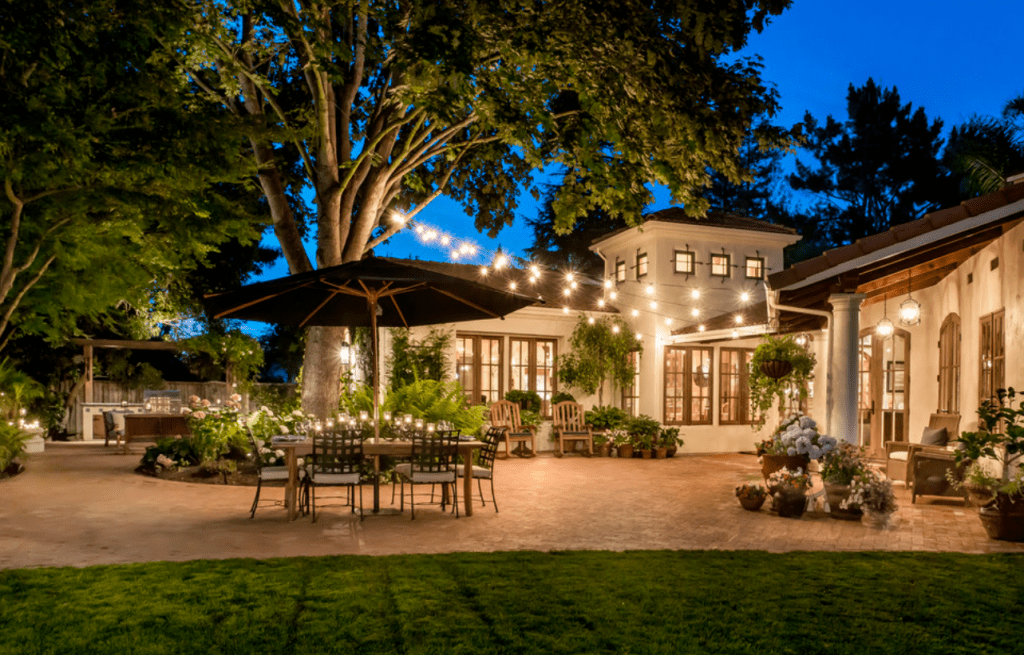 I LOVE these strings of lights. They really make me want to light a fire pit and drink some sangria. When we put our house on the market we took down our outside lights and I miss them.