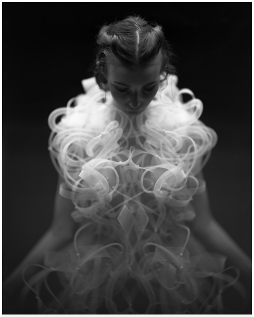 I love this image. I love the black and white and the so very white, white. Image titled: ”LastBreathe” by Robert Wun, Fashion, 2011 I'm not sure who the photographer is but the link it was found on: http://robertwun.com