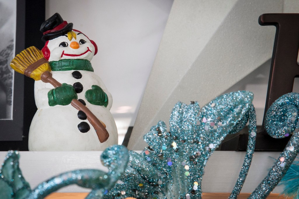 This little snow man is a piece from when I was a very little girl. My mom hand painted it. I never really noticed it until I was six. My single mom just bought the condo I grew up in and the day us three girls moved in was December 7th, 1971. It was close to Christmas and I remember opening this up from our boxes and putting it on our little gas fireplace. After stealing this from my mom, I make sure it is one of the first decorations I put up on our fireplace, every year. 