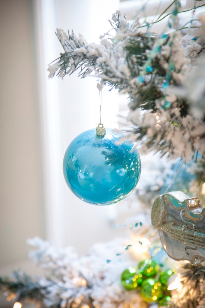 Blue filler bulbs. A solid color is a must for any tree. They ground the scheme for sure.