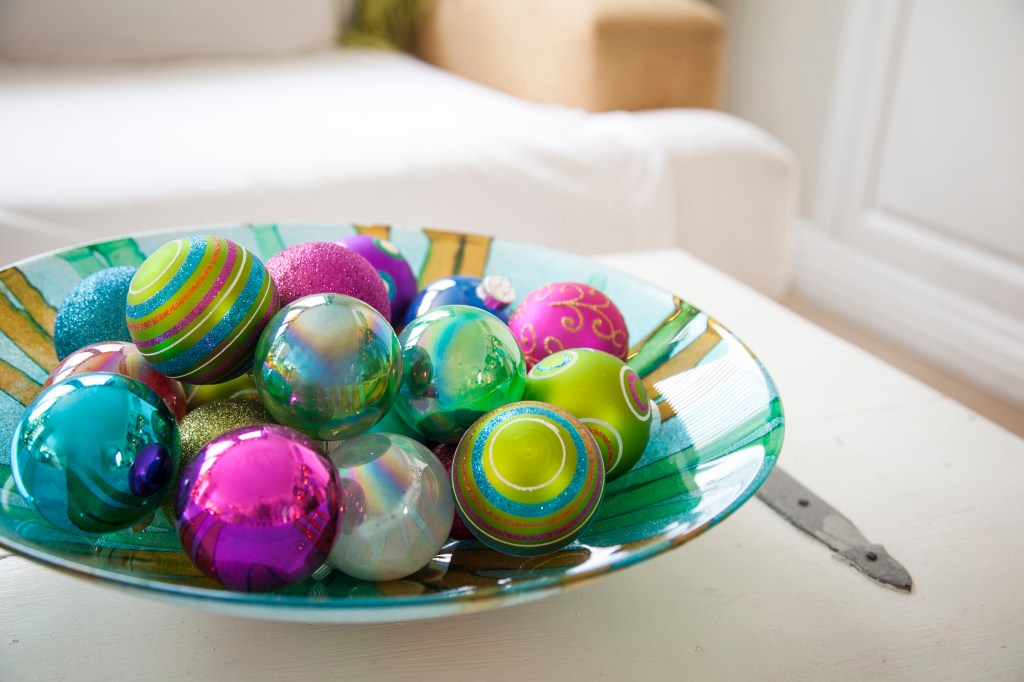 Hand-me-down ornaments. I LOVE the colors but they don't match, or do they? Who cares, they're fabulous! Some of these are also handmade by the girls.