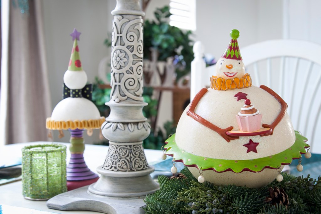 My personal favorites. These little snowmen came from Department 56. They are from a line called Snow Biz and I think they were only out a couple of years and then discontinued. I was so sad because I think they're so precious. I have several pieces on my snow man garland (not shown in this post). 