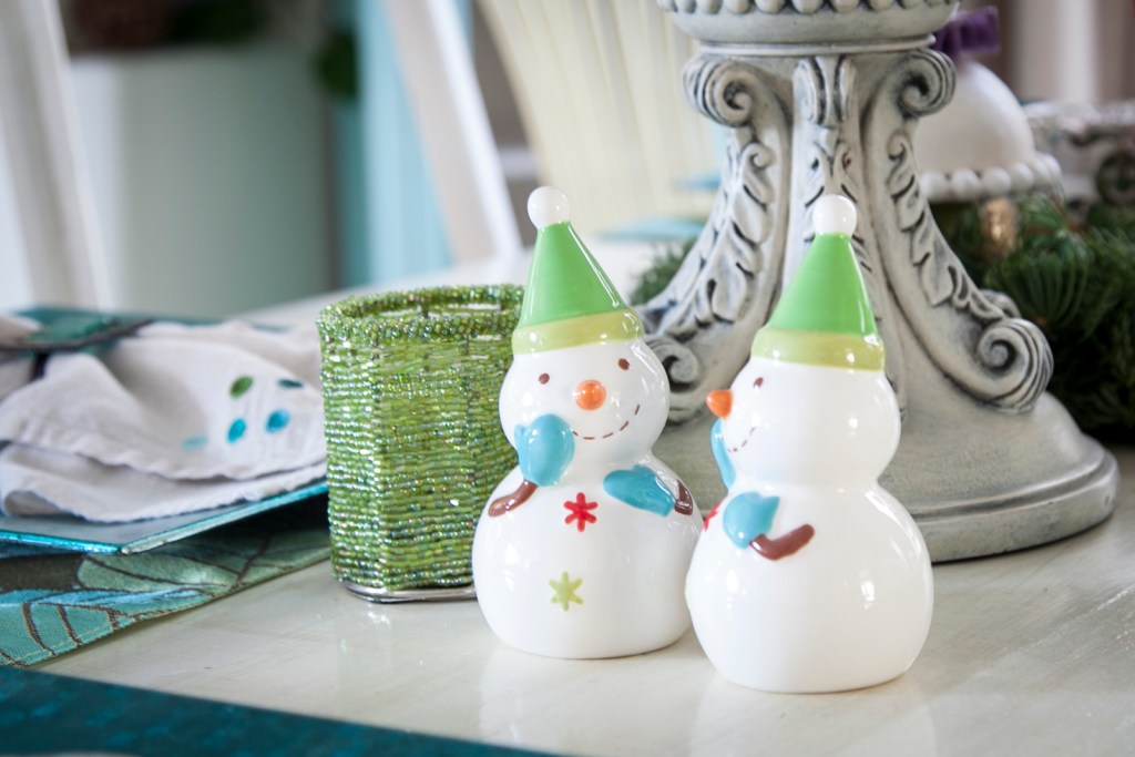 Salt and pepper shakers. Emma puts them close because she said they are telling secrets.