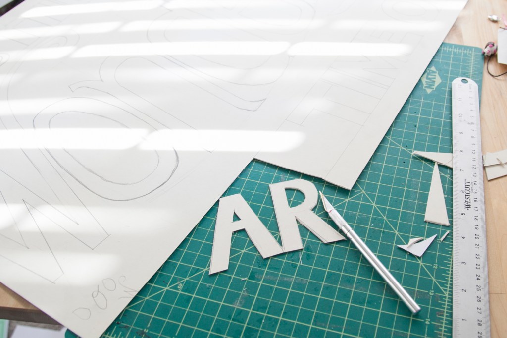 I started cutting the letters out thinking I could keep them all attached to each other but that was not going to happen.