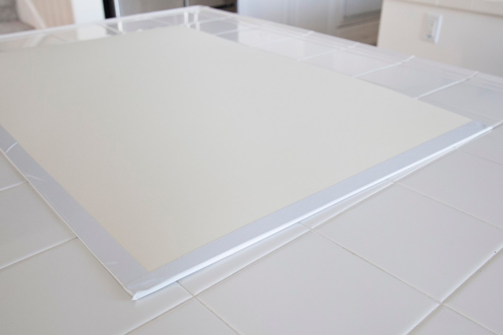 Then, I used my handy dandy Duct tape. (You'll learn I'm big on duct tape). I sealed up three of the edges and slid my little holiday sign in to be kept safe until next year. 