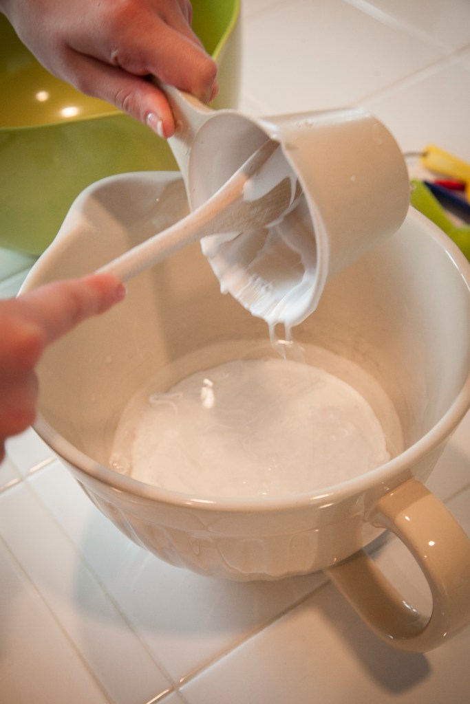 Mixing the glue and water.