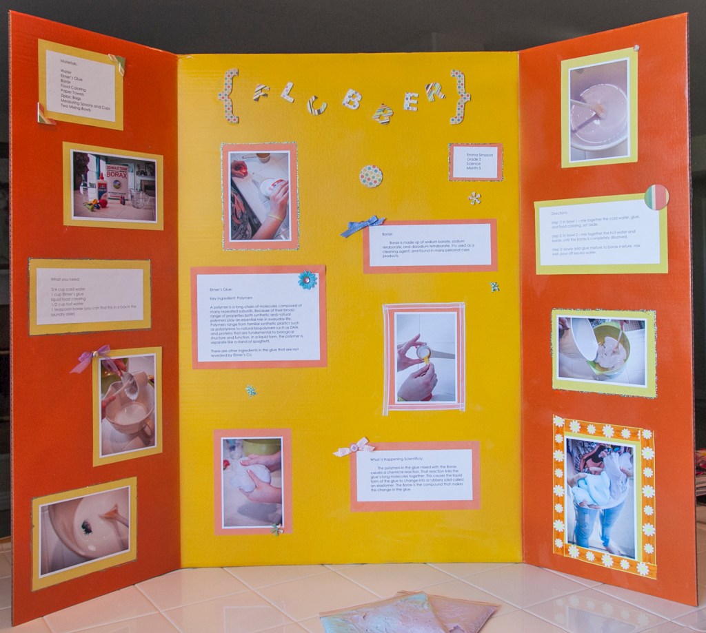 Here is Emma's completed board for school. She usually plays it pretty clean and simple, but this time she really wanted to stretch and use some sparkles... You can tell she's the design conservative sister of my three girls.