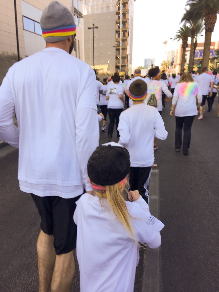 Then we saw a lot of this: The back of Mike and Nora! That tiny girl ran like crazy! She ran more than the other two and after a while I could see them up ahead, Mike with Nora on his shoulders, still running!