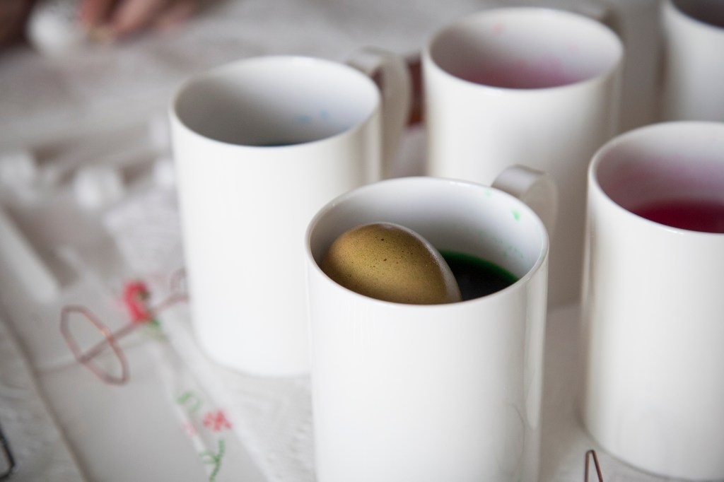 As a side note, if you do blow out the eggs, it's rather difficult to keep the eggs down in the dye. They may be better for hand drawn designs.