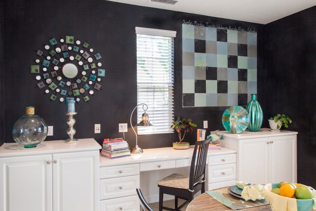 Here's a picture of what I did with her design. We've loved having this wall. 