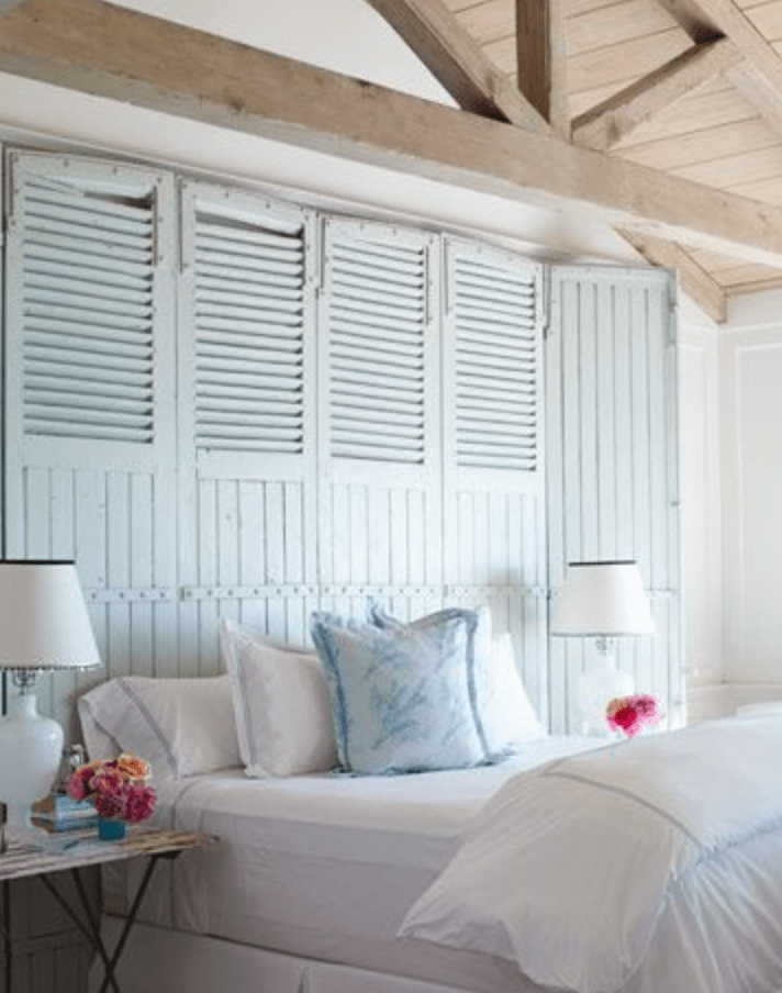 You wouldn't even have to paint the walls, just an old set of shutters painted becomes a new head board! http://www.housebeautiful.com/decorating/white-beach-house-in-california-0910