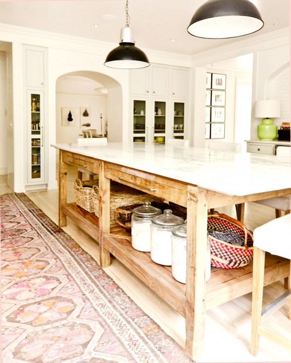 I really love this big chunky table as the kitchen island. I think I'm going to head over to a few antique stores in Orange and see what I can find for island options. http://www.domainehome.com/persian-rugs-for-the-kitchen