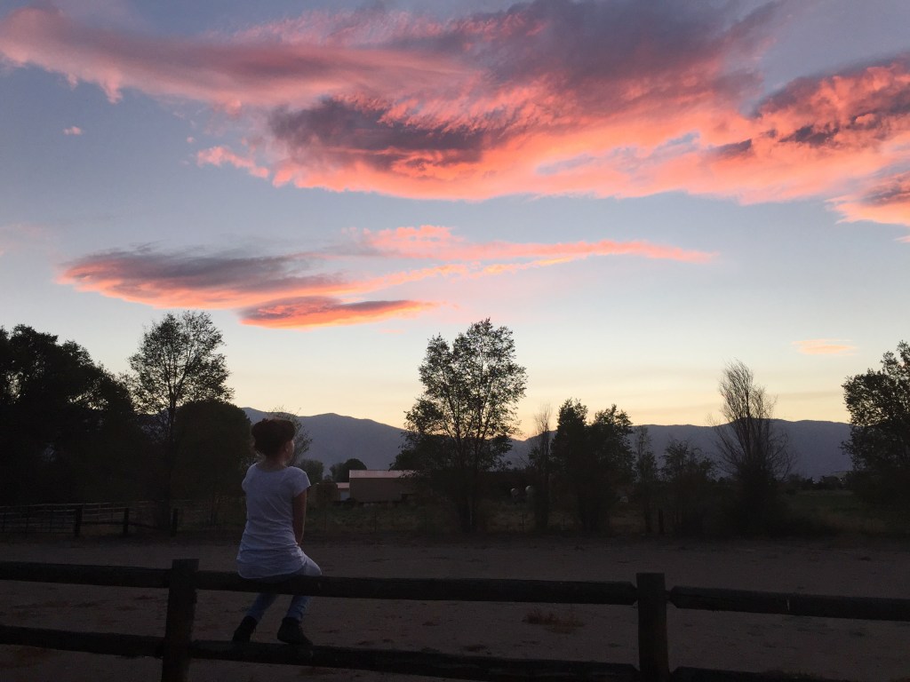 Emma watching the sunset.